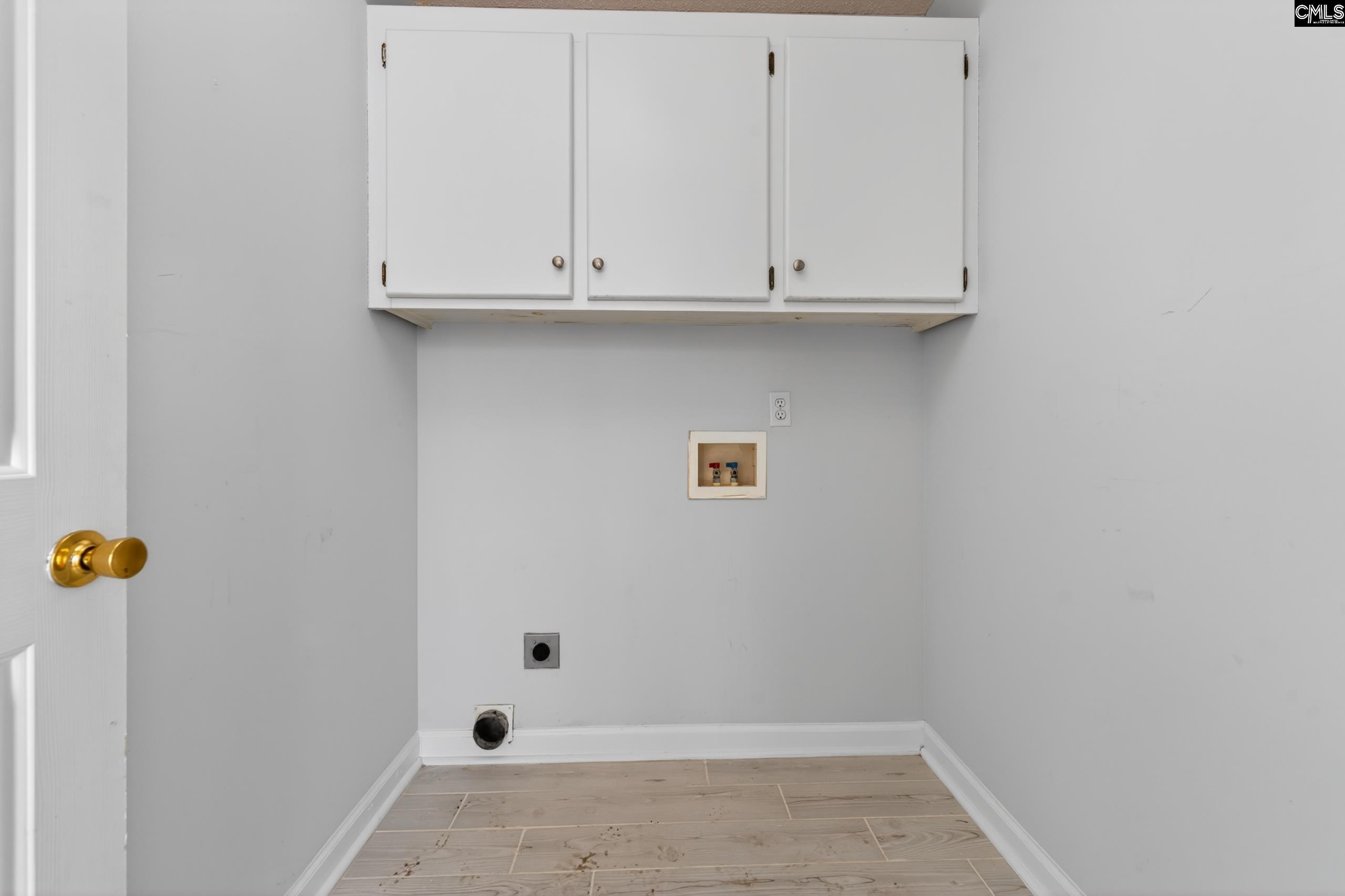 219 Plantation Pointe Drive Elgin, SC 29045 - Photo 10 of 56 a view of storage and utility room with wooden floor