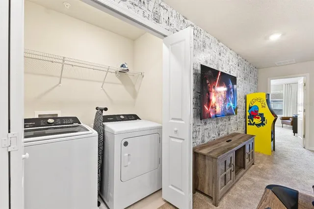 a dining room with furniture and window