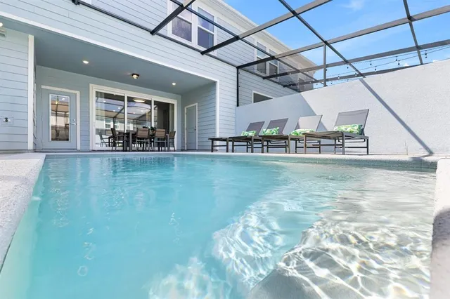 a view of a backyard of a house