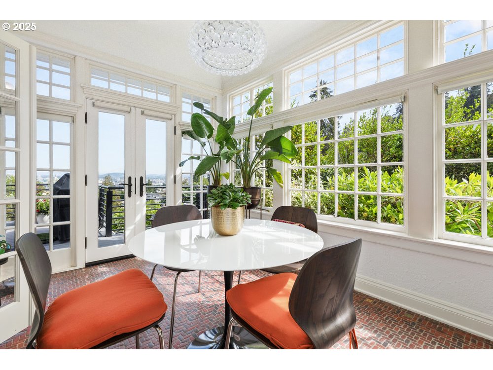 2677 Northwest Westover Road Portland, OR 97210 - Photo 17 of 48 a view of a dining room with furniture window and outside view