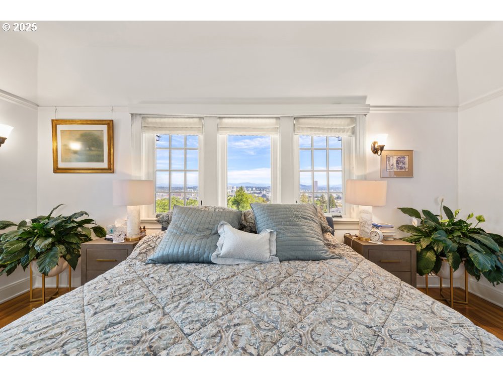 2677 Northwest Westover Road Portland, OR 97210 - Photo 29 of 48 a bedroom with a bed window and table chair