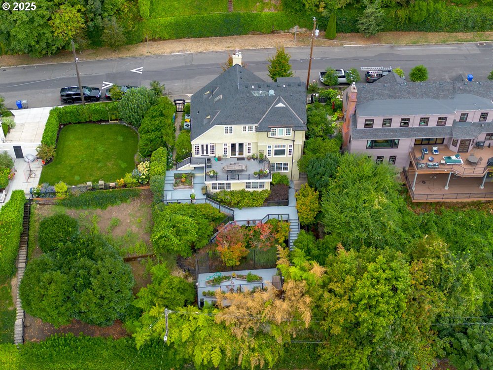 2677 Northwest Westover Road Portland, OR 97210 - Photo 3 of 48 an aerial view of a house with a yard and lake view