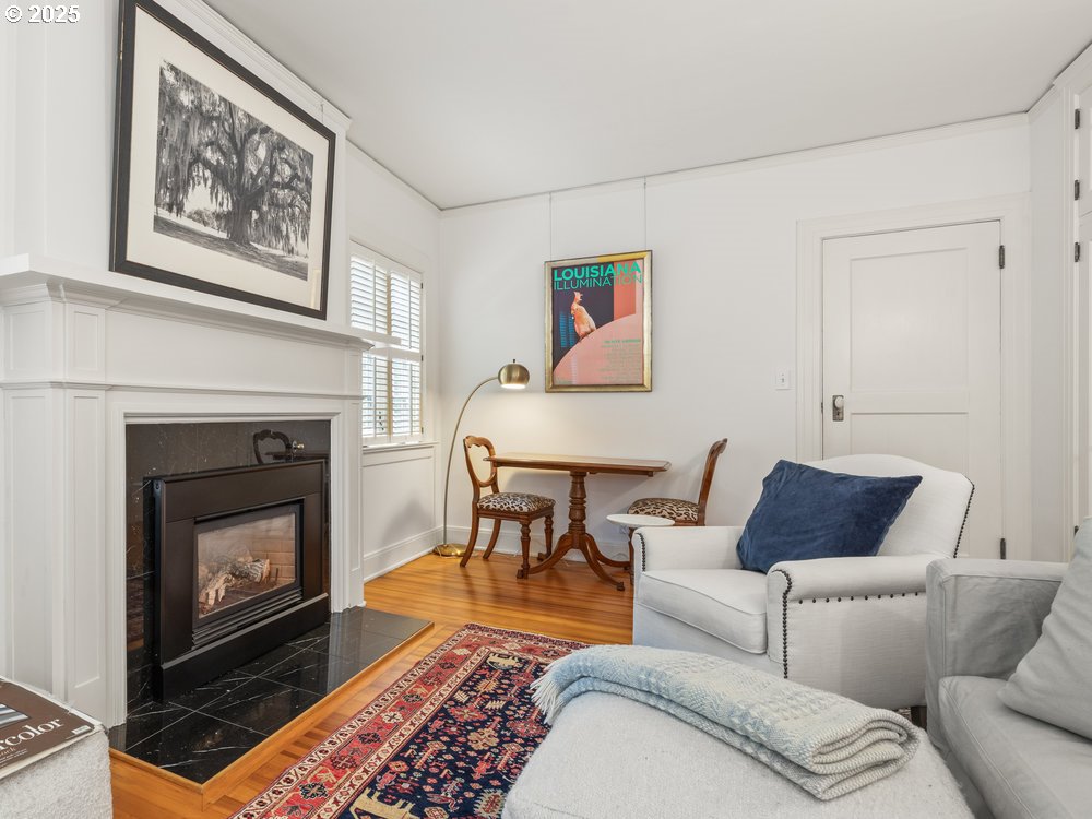 2677 Northwest Westover Road Portland, OR 97210 - Photo 34 of 48 a living room with furniture and a fireplace