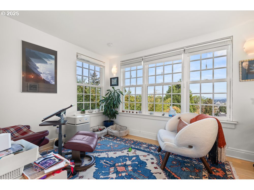 2677 Northwest Westover Road Portland, OR 97210 - Photo 41 of 48 a living room with furniture and a large window