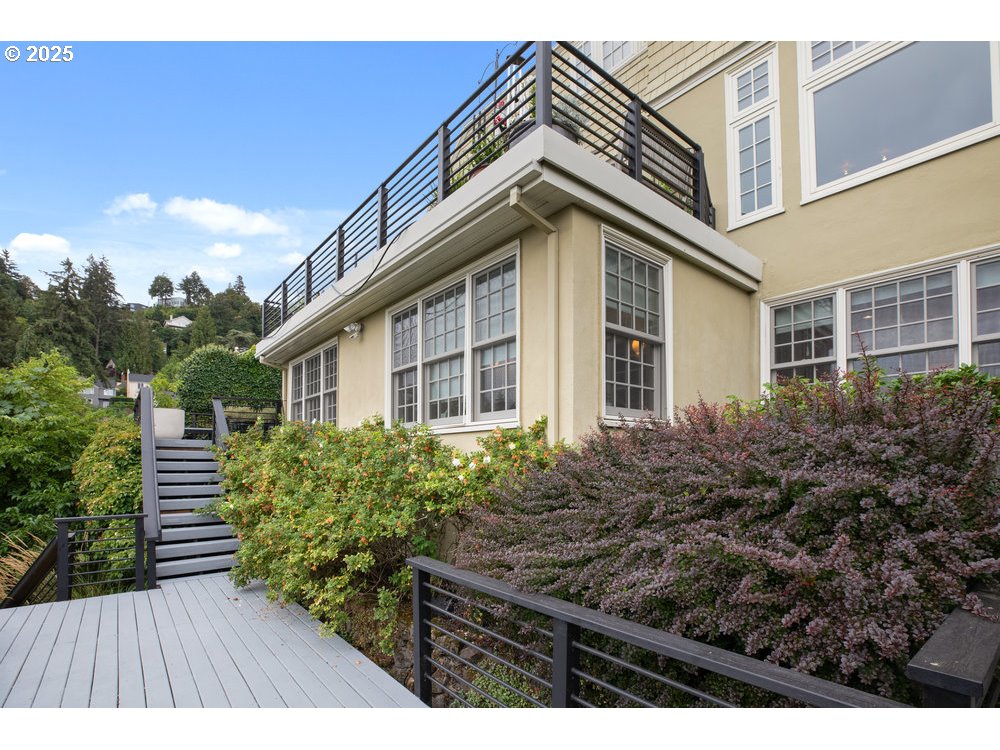 2677 Northwest Westover Road Portland, OR 97210 - Photo 45 of 48 a view of a house with a wooden fence