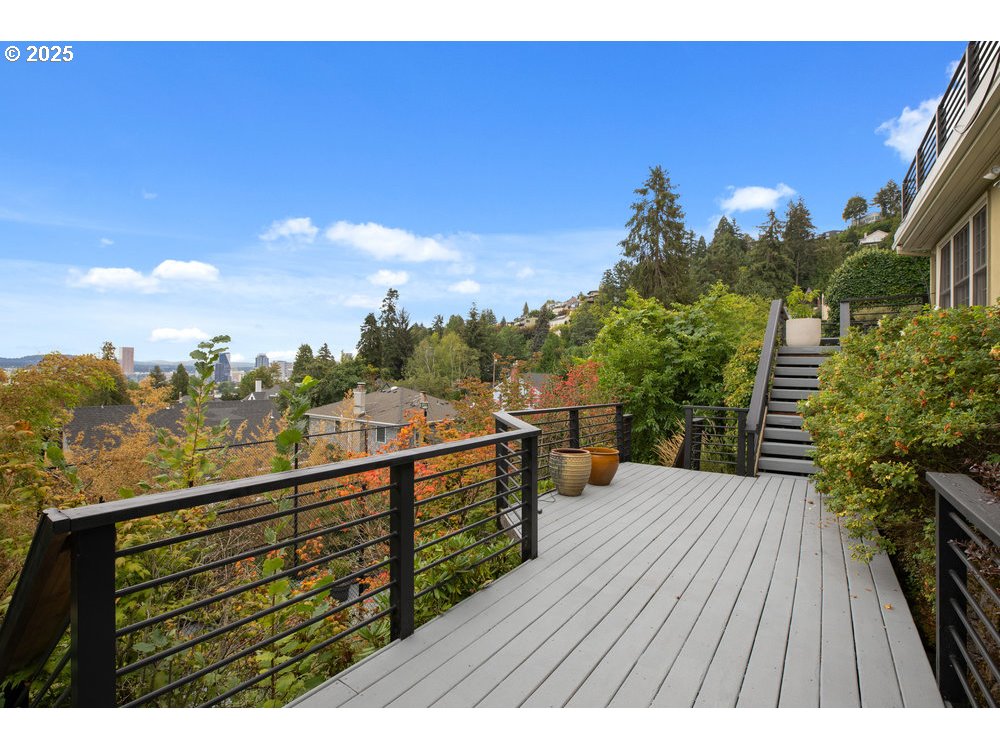 2677 Northwest Westover Road Portland, OR 97210 - Photo 46 of 48 a view of a balcony with wooden floor and city view