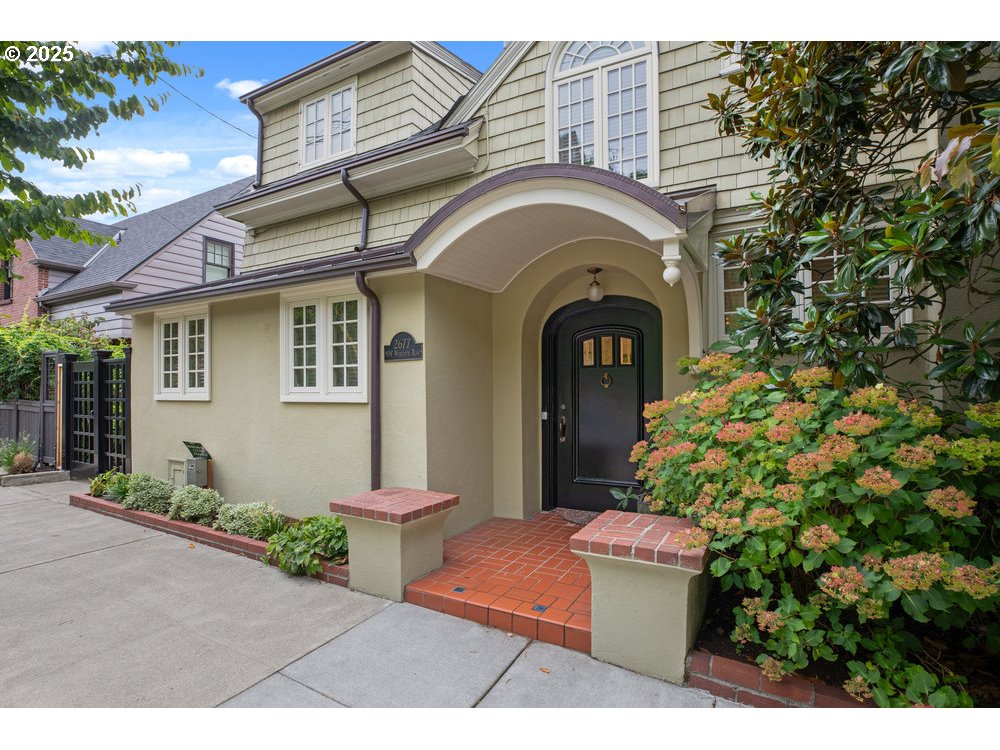 2677 Northwest Westover Road Portland, OR 97210 - Photo 5 of 48 a front view of a house with a garden