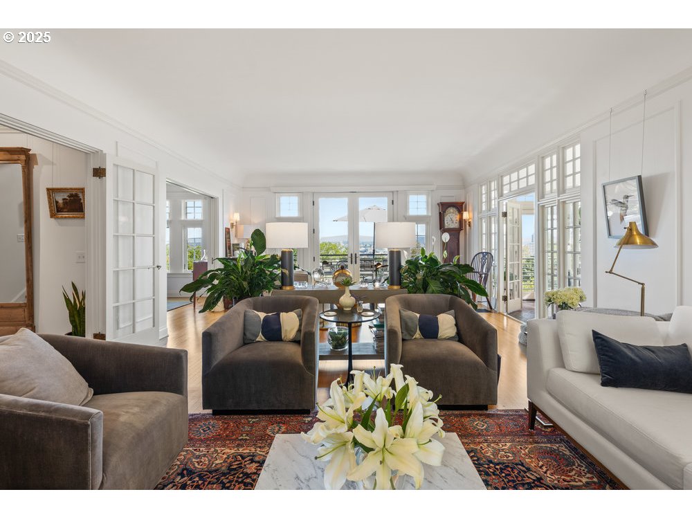 2677 Northwest Westover Road Portland, OR 97210 - Photo 7 of 48 a living room with furniture and a large window