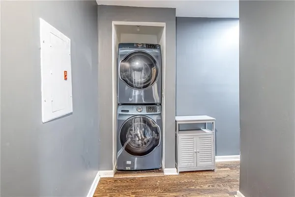 a view of a hallway with washer and dryer