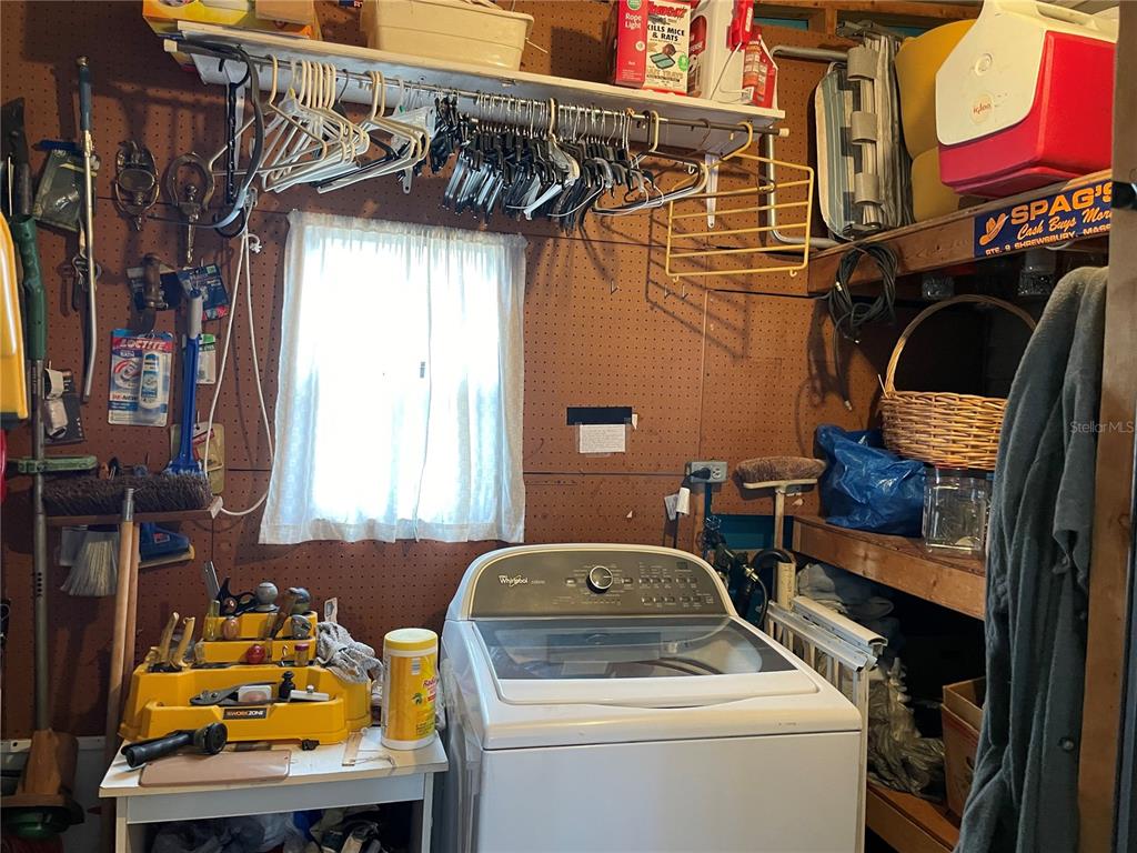 251 Patterson Road, Unit C25 Haines City, FL 33844 - Photo 9 of 10 a utility room with dryer and washer