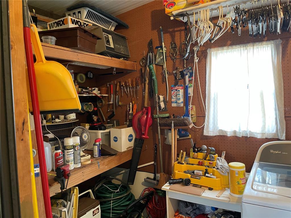 251 Patterson Road, Unit C25 Haines City, FL 33844 - Photo 10 of 10 a view of walk in closet with clothes and shoes