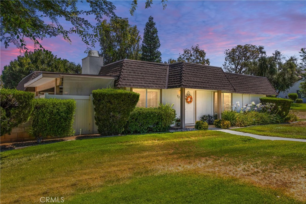 a view of a big yard next to a house