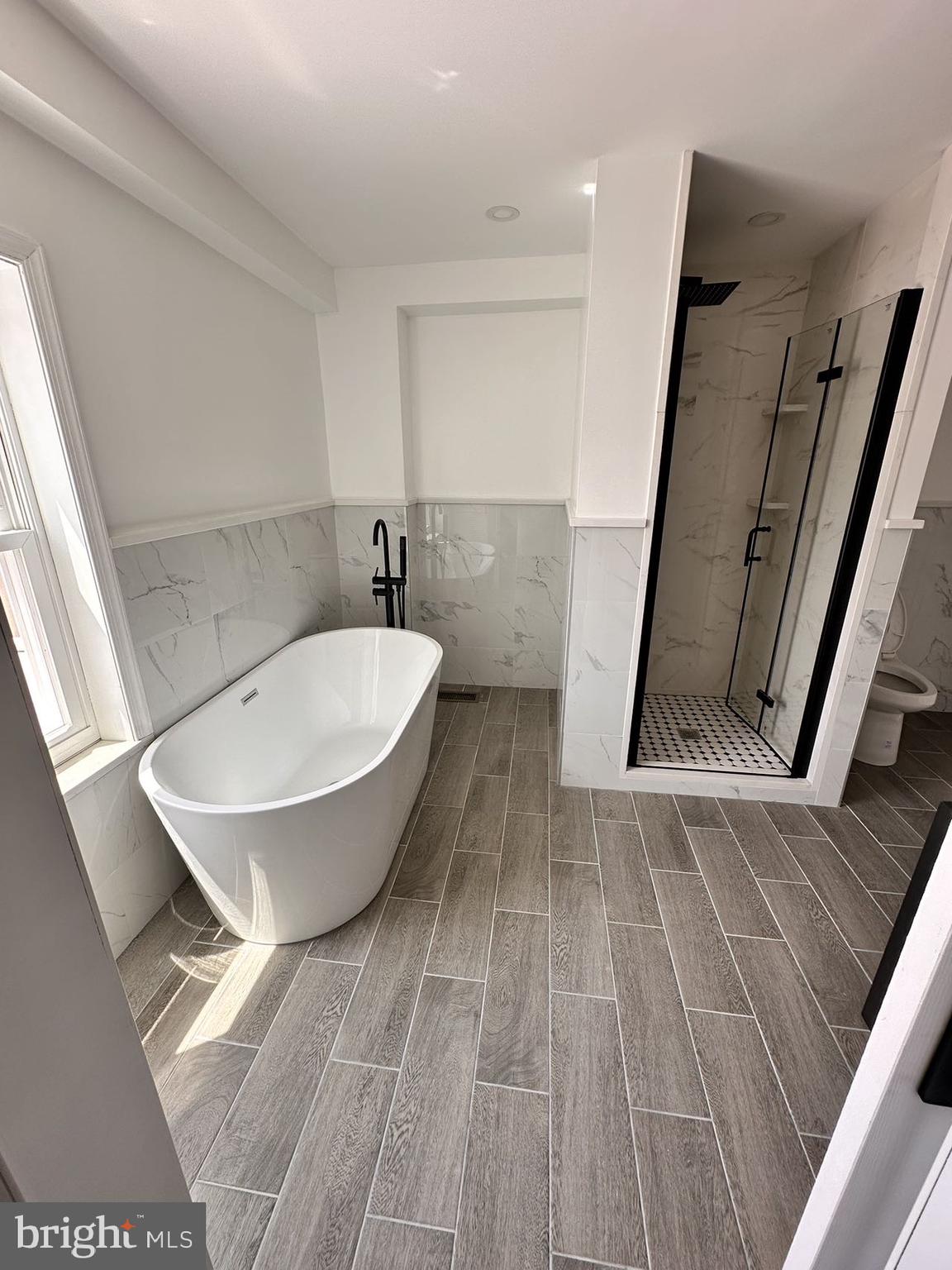 540 Manton Street Philadelphia, PA 19147 - Photo 18 of 25 a bathroom with a sink and a mirror