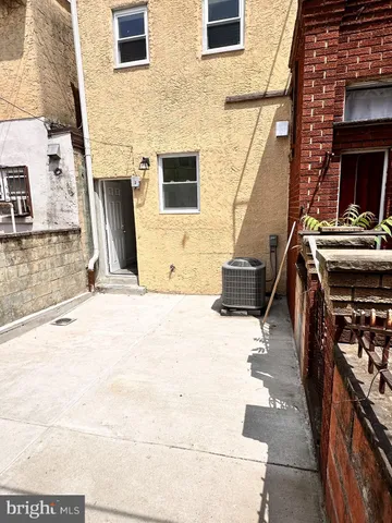 a spacious bathroom with a double vanity sink and a mirror