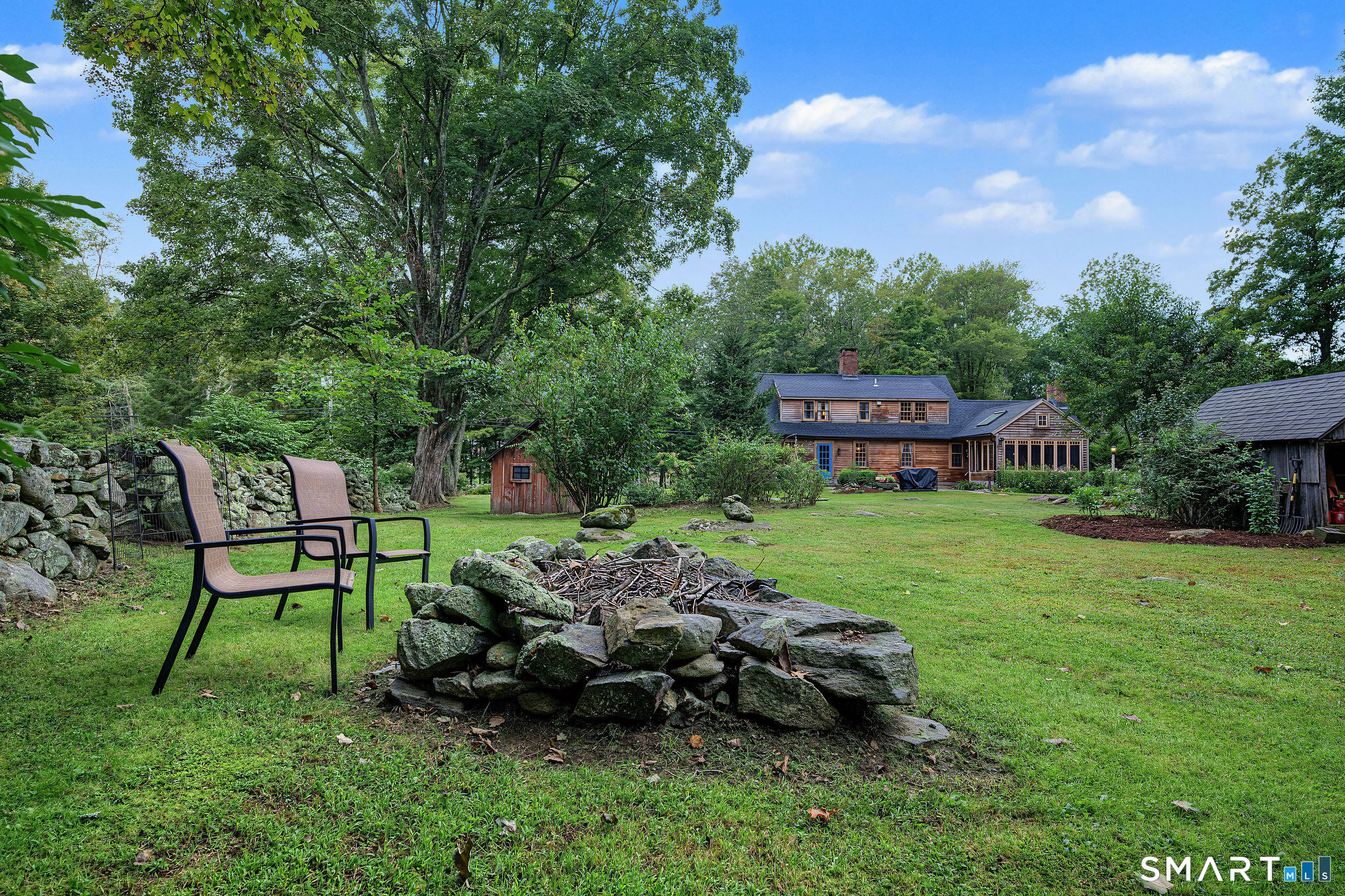 150 Race Hill Road Madison, CT 06443 - Photo 38 of 40 Stone firepit.