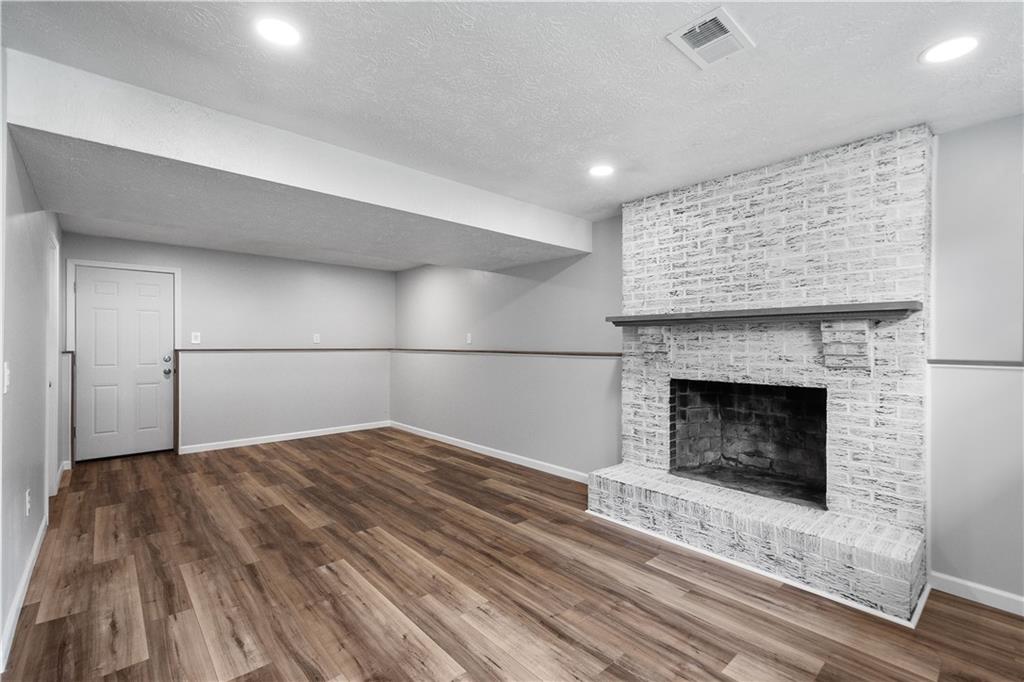 1300 Greenhill Rd Extension Pittsburgh, PA 15209 - Photo 22 of 32 Finished basement with fireplace