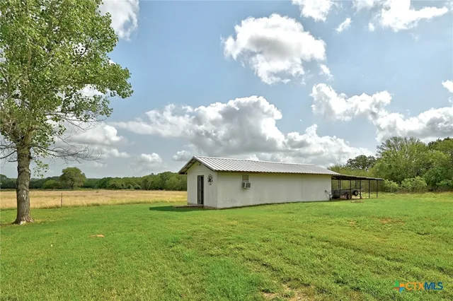 an aerial view of ocean residential houses with outdoor space