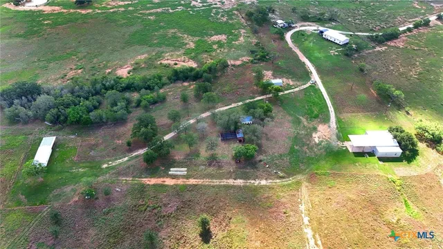 a view of a park with lots of trees