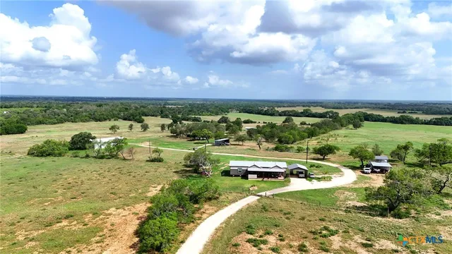 a view of a lake with a big yard