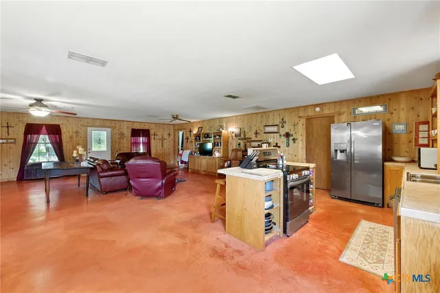 a bed room with a bed and a chandelier