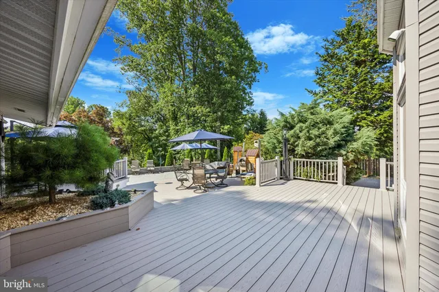 a view of deck with wooden floor and outdoor seating