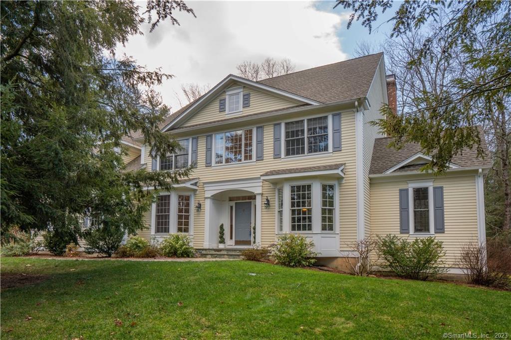 Welcome to this beautiful & well maintained property in the Great Pond Woods community.