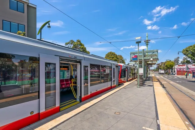 an aerial view of houses with outdoor space