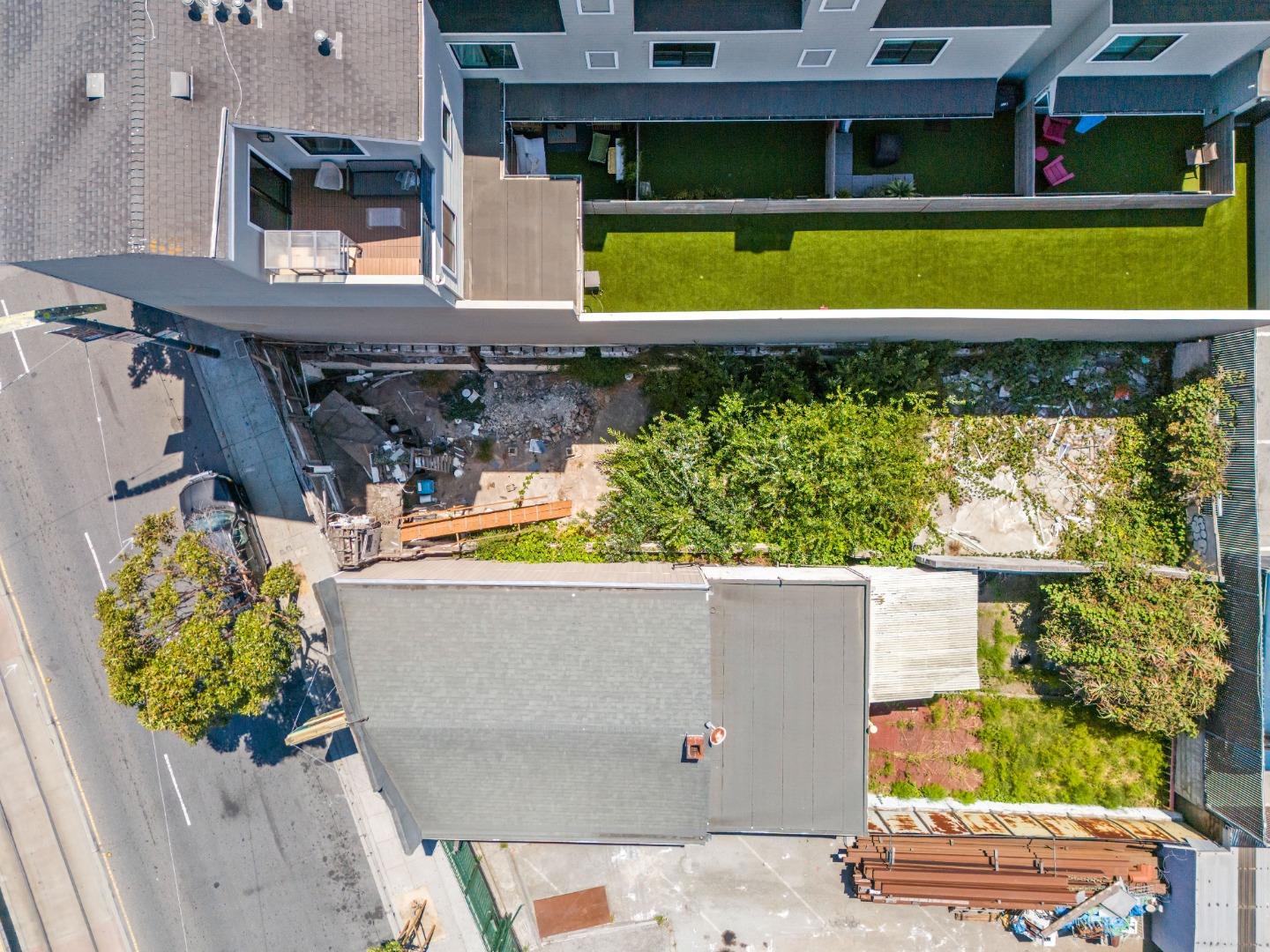 4128 3rd Street San Francisco, CA 94124 - Photo 10 of 21 an aerial view of a swimming pool with a yard