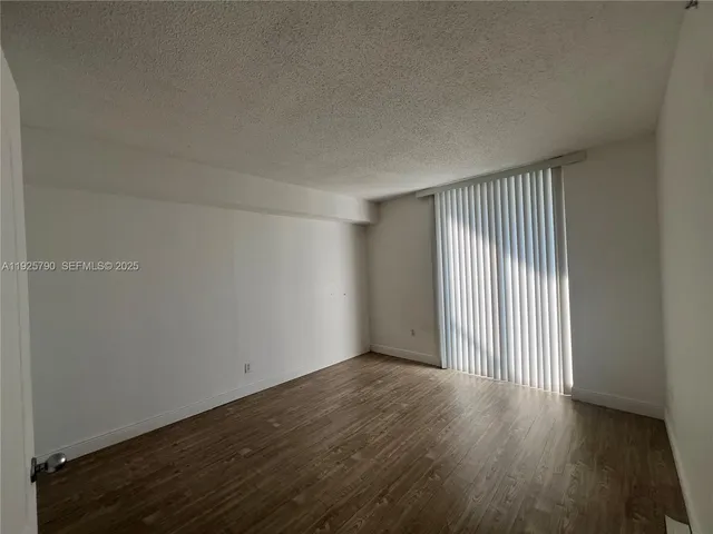 a bathroom with a sink toilet double vanity and shower