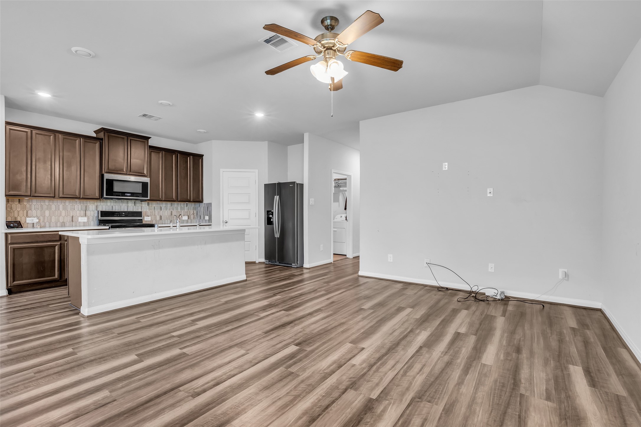 827 Cloverdale Drive Rosharon, TX 77583 - Photo 22 of 22 This lovely open concept floorplan is designed for hosting guests where even the chef can stay involved.