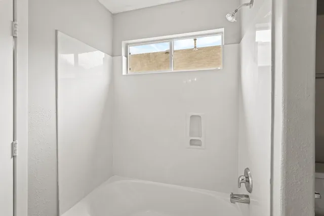 a bathroom with a bathtub