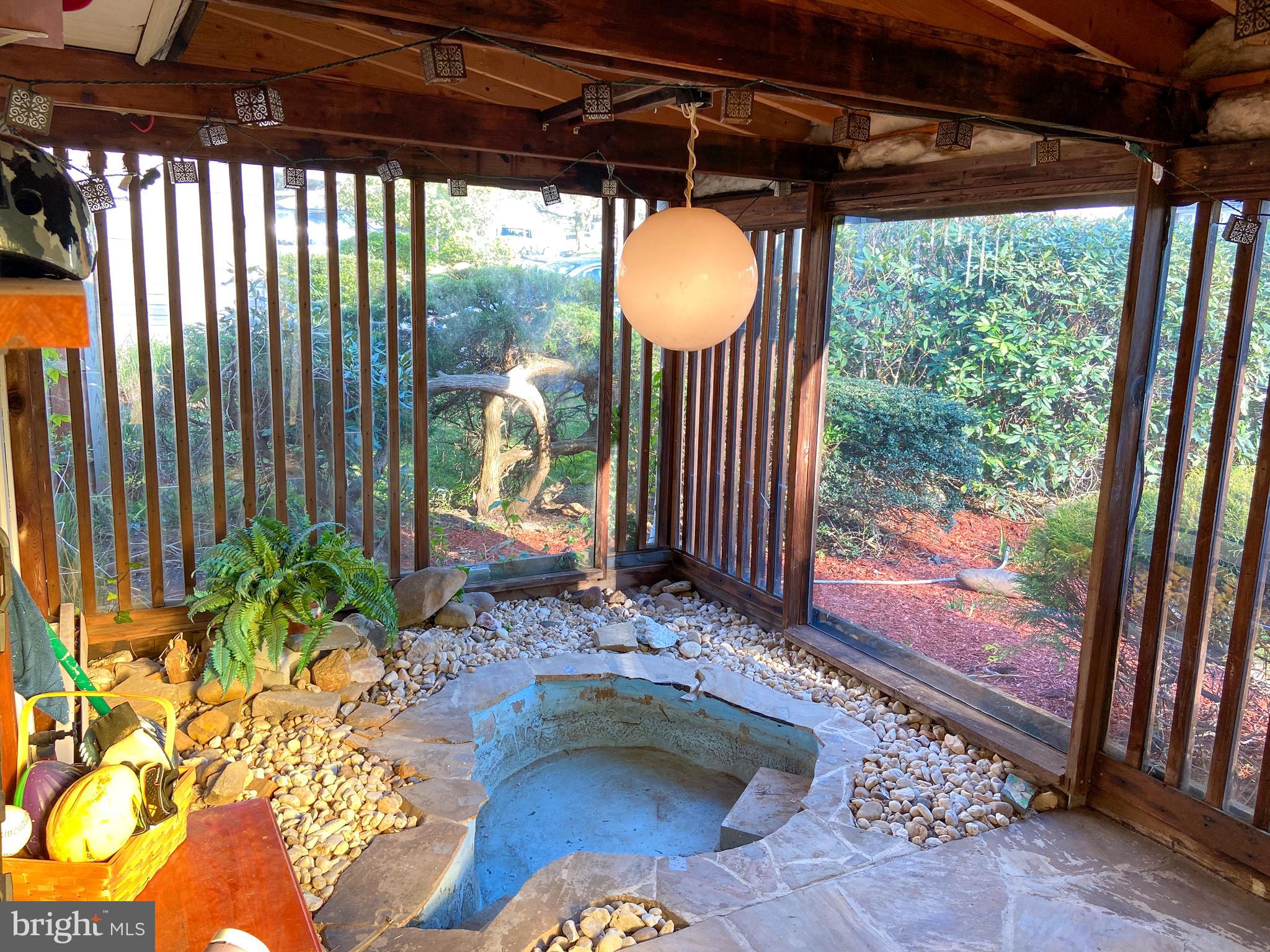 37 Quarter Turn East Road Levittown, PA 19057 - Photo 42 of 48 Enclosed front porch featuring fish pond
