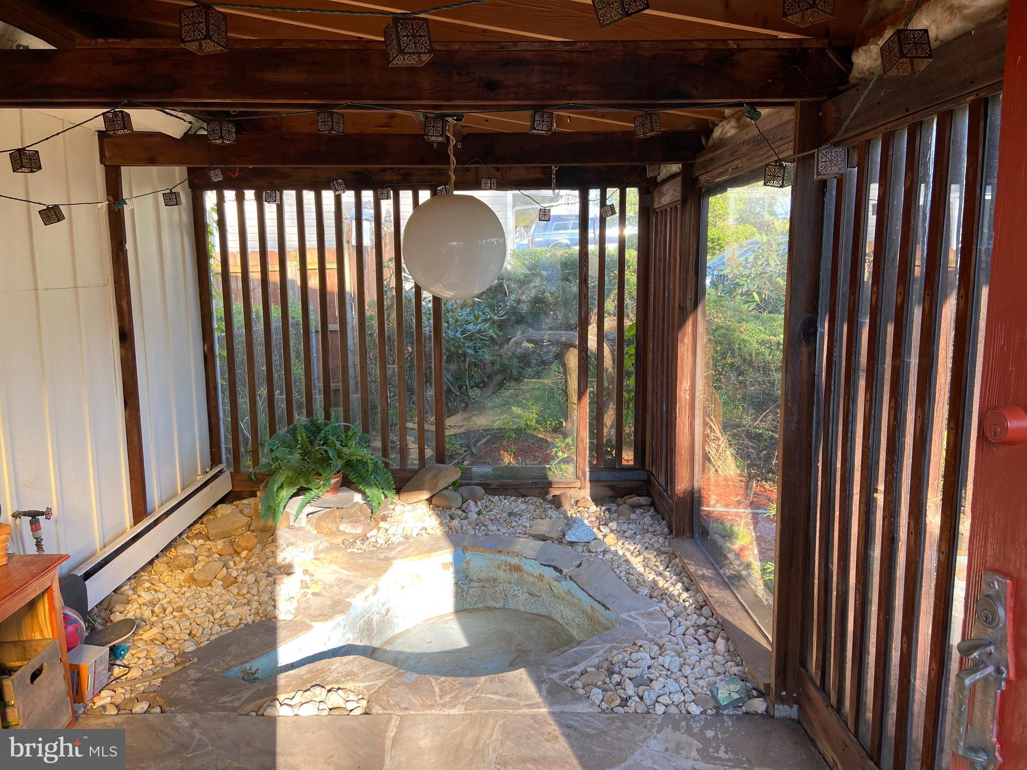 37 Quarter Turn East Road Levittown, PA 19057 - Photo 43 of 48 Enclosed front porch featuring fish pond