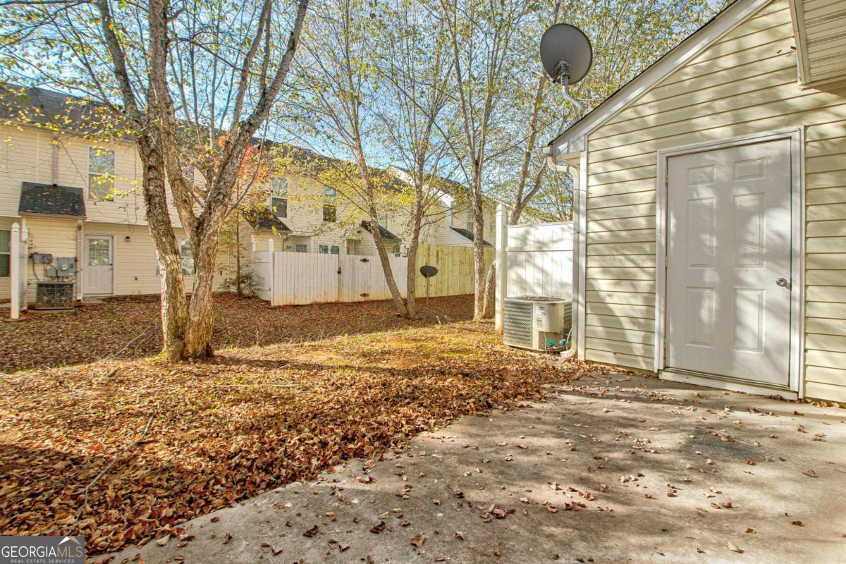 1915 Grove Way Hampton, GA 30228 - Photo 22 of 25 a view of a backyard of the house