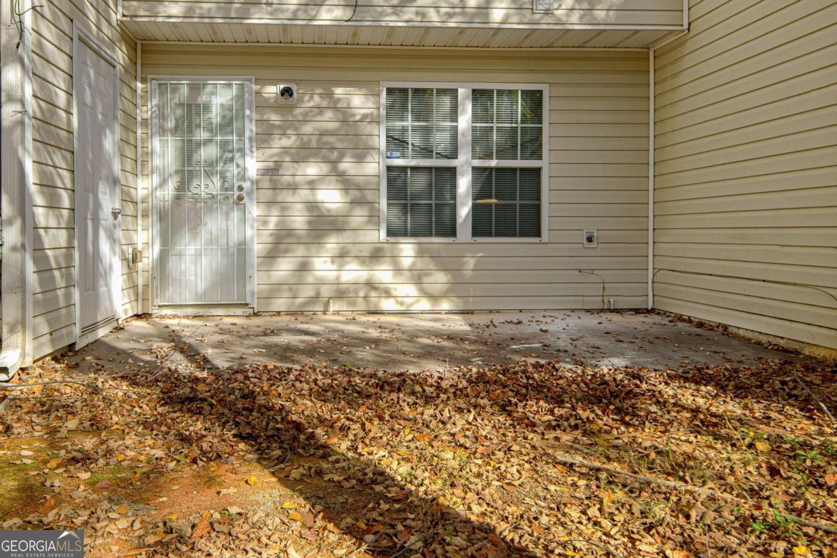 1915 Grove Way Hampton, GA 30228 - Photo 25 of 25 a view of entrance gate of a house