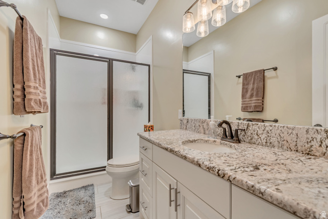 2543 East 700 South Springville, UT 84663 - Photo 47 of 73 Bathroom featuring vanity, a stall shower, and recessed lighting