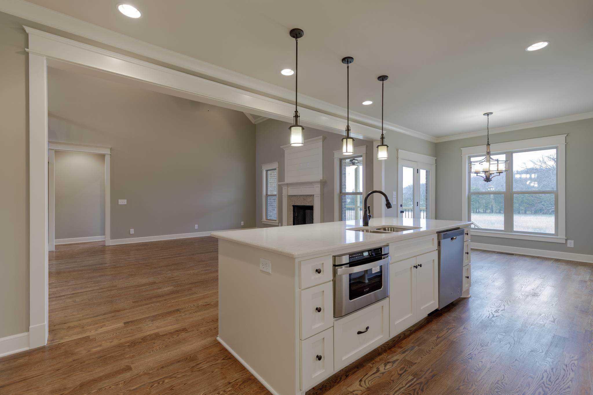 1720 Dillon Road Milton, TN 37118 - Photo 11 of 30 a kitchen with a stove and wooden floor