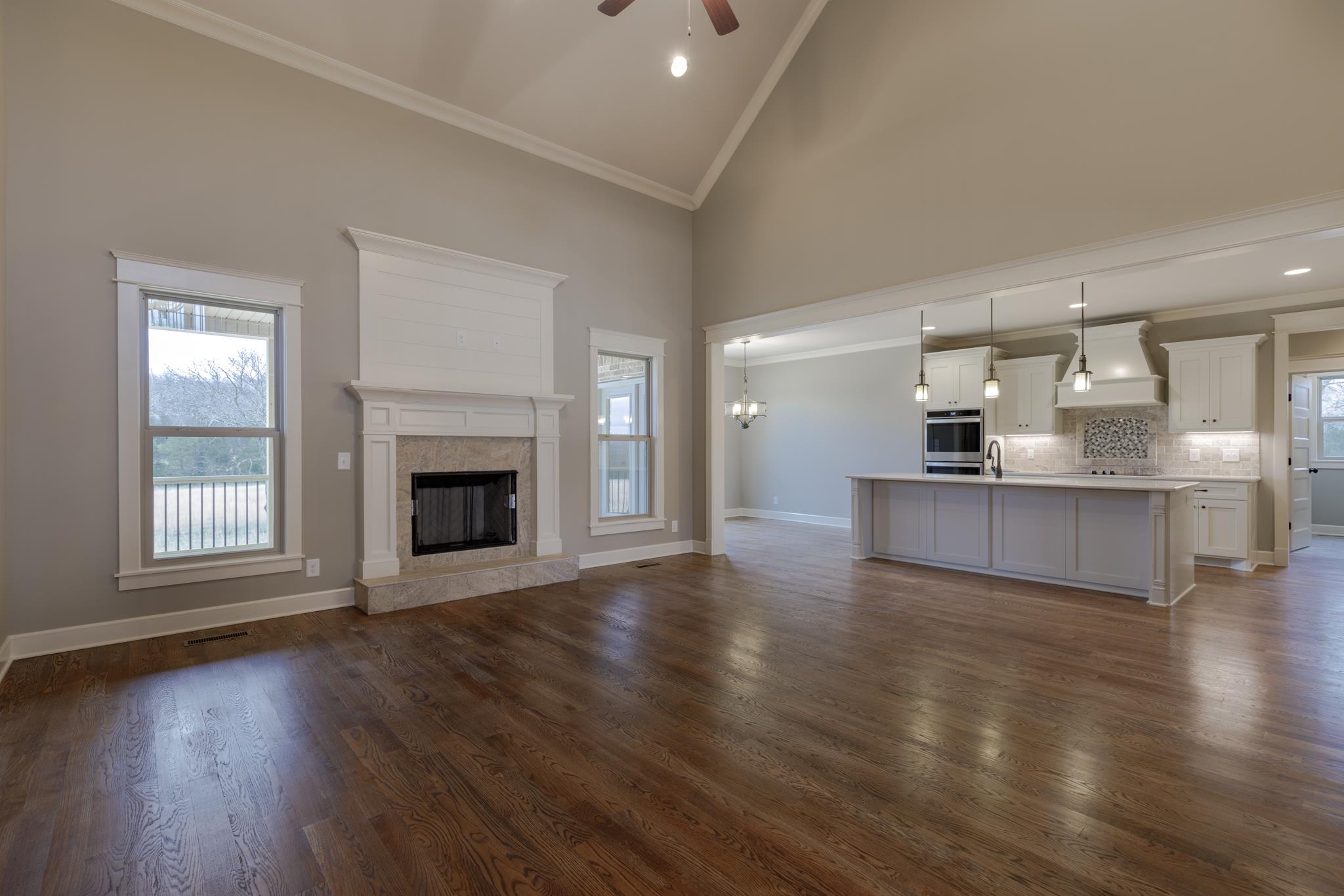 1720 Dillon Road Milton, TN 37118 - Photo 12 of 30 a view of a kitchen with a sink and a fireplace