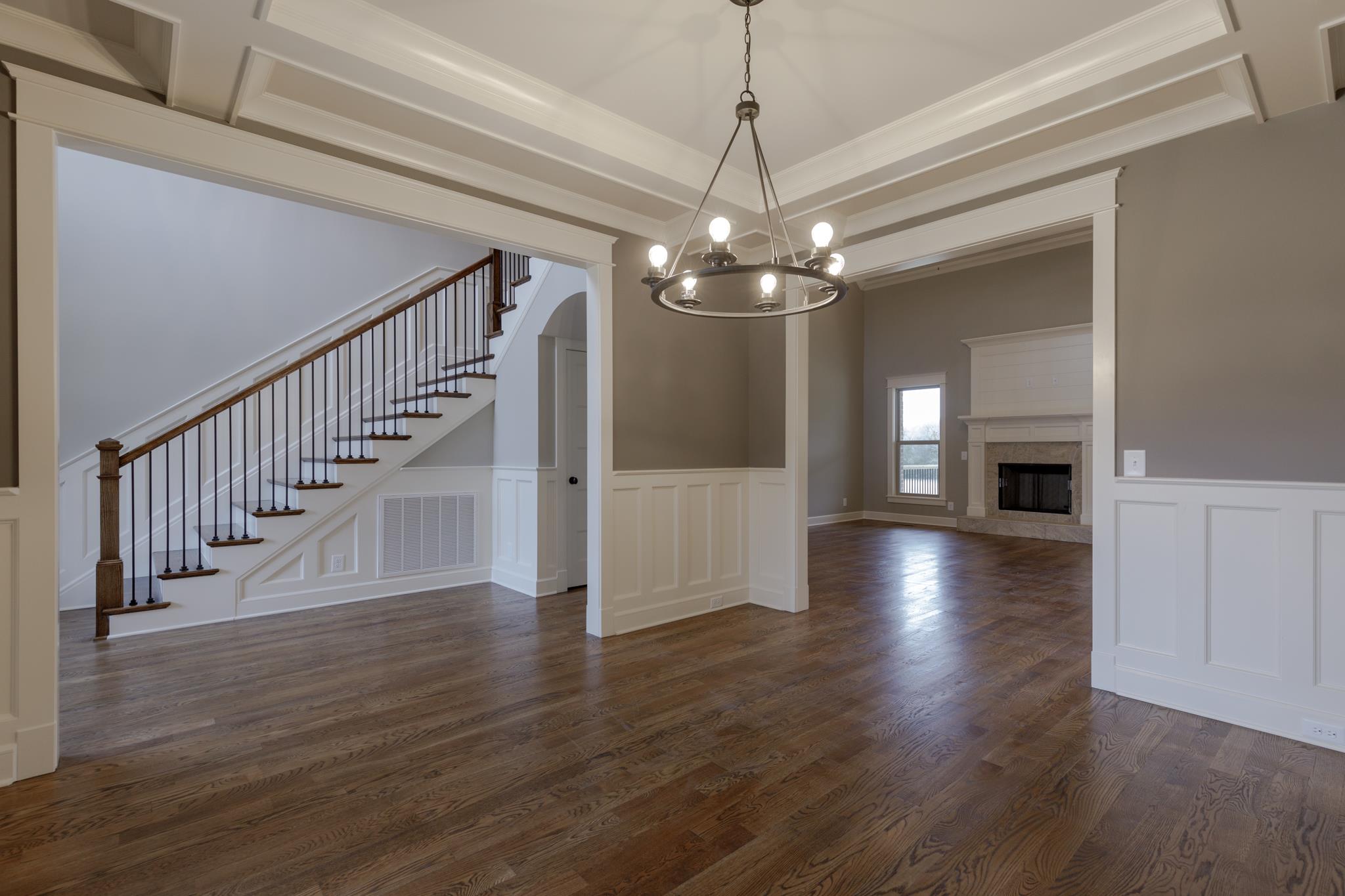 1720 Dillon Road Milton, TN 37118 - Photo 14 of 30 a view of a livingroom with wooden floor fireplace and windows
