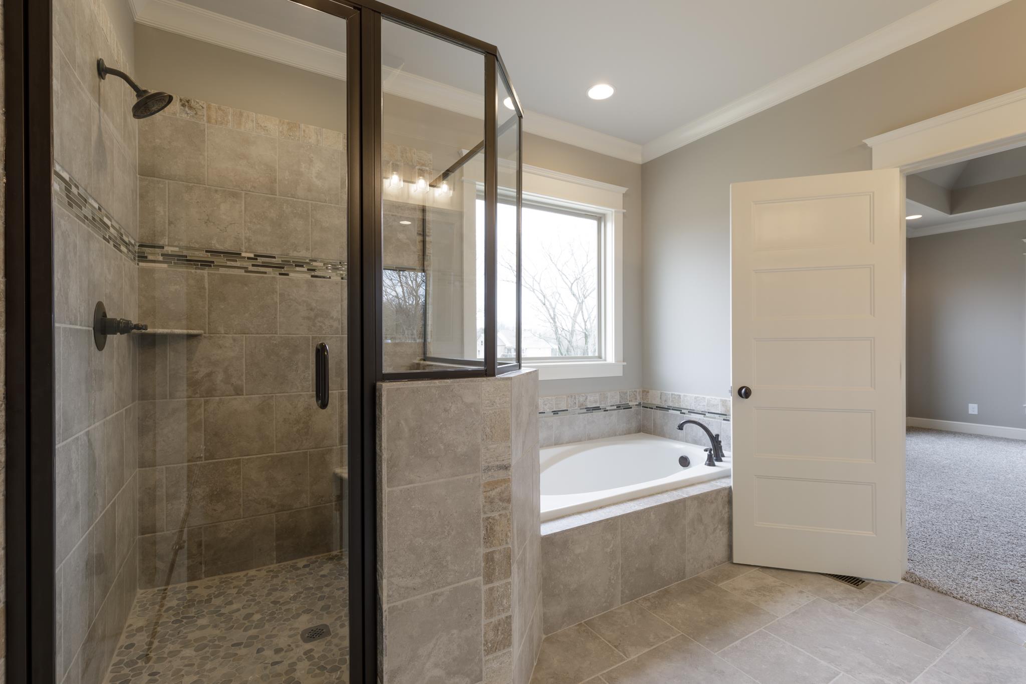 1720 Dillon Road Milton, TN 37118 - Photo 19 of 30 a bathroom with a bathtub and shower