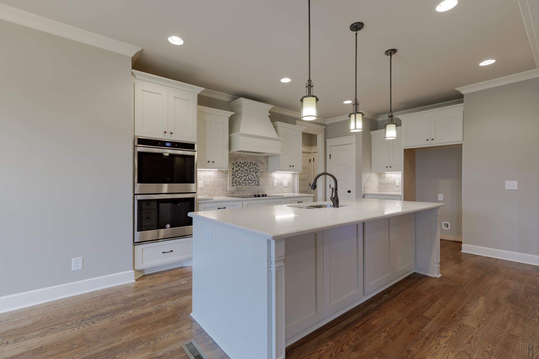 1720 Dillon Road Milton, TN 37118 - Photo 10 of 30 a large kitchen with kitchen island a sink stainless steel appliances and cabinets