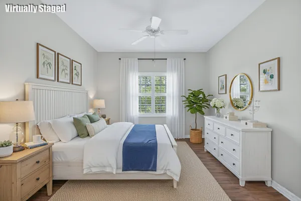 a spacious bedroom with a large bed and a window