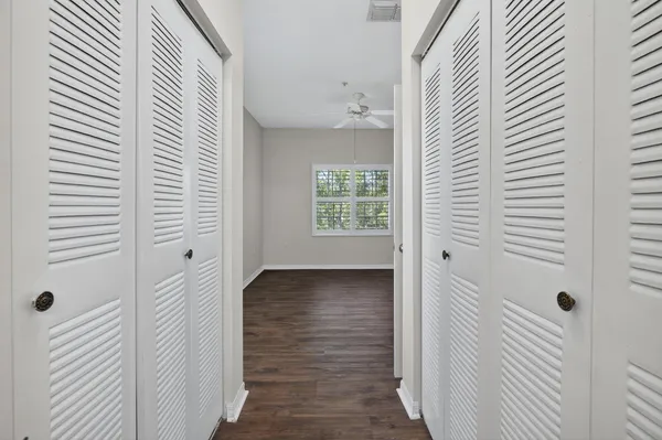 a view of a hallway with front door