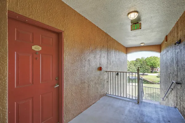 a view of a porch with a door