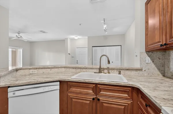 a sink with granite countertop a sink and a granite counter top