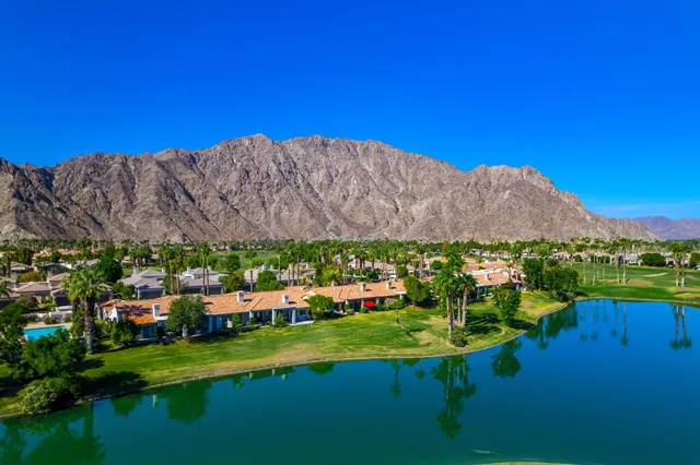 a view of a lake with a building in the background