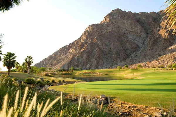 a view of an ocean and a mountain