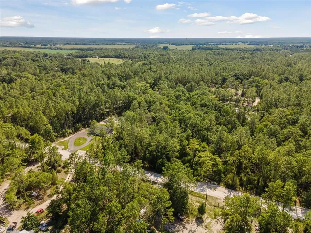 a view of a yard with an outdoor space