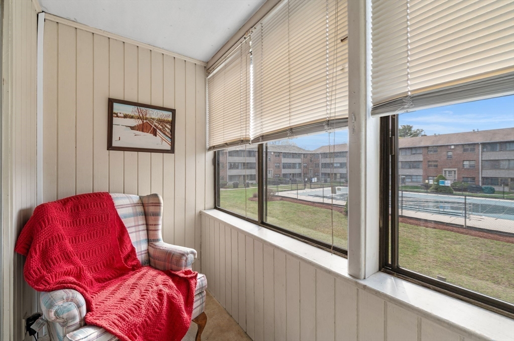 68 Preston Street, Unit 9D Wakefield, MA 01880 - Photo 21 of 29 a living room with furniture and a window
