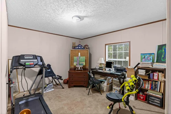 a en suite bathroom with a sink and a mirror